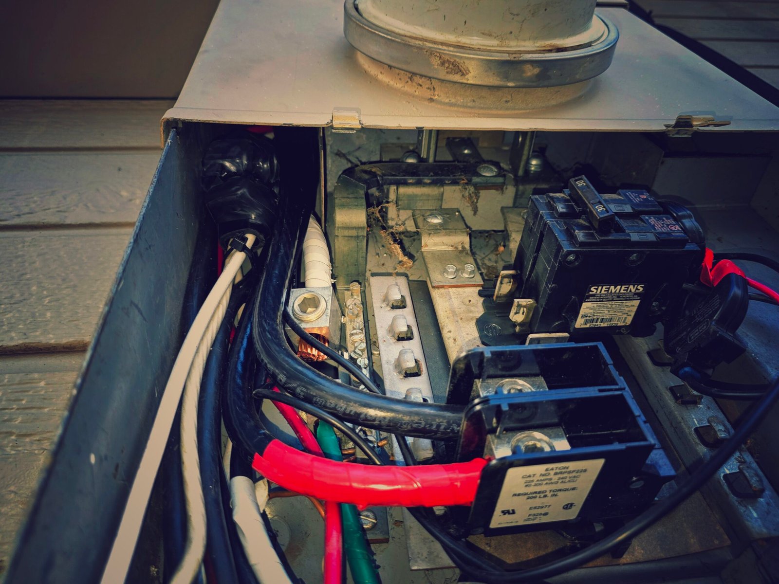 The Hidden Problems Found During Real Estate Solar Inspections 1 main electrical panel solar breaker scaled | McKnight Solar Diagnostics | Expert Diagnostics. Reliable Solar & Battery Repair.